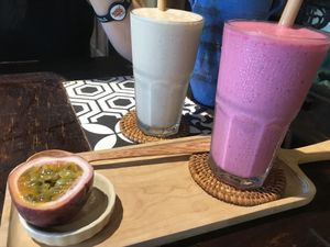 Passion fruit + dragon fruit smoothie and banana, oak milk + dates smoothie  at Nourish in Hoi An