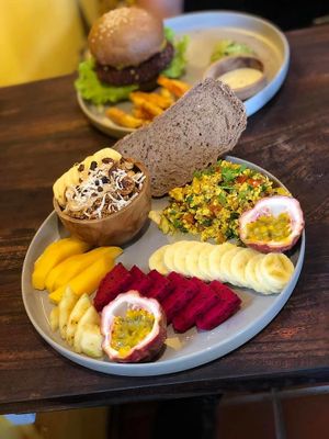 Combo: Scrambled tofu, toast, fruits, Nutty Overnight Oats + a coffee! at Nourish in Hoi An