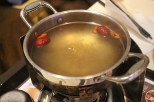 Soup base for hotpot at Táiwān RénDào SùCài in Shanghai