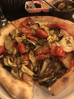 Zucchini, eggplant and bell pepper pizza with vegan cheese and fresh tomatoes at Azzurra Nordkraft in Aalborg