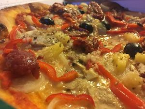 No. 4 + olives and sundried tomatoes and vegan cheese.
They have it but not marked on the menu - ask! at Azzurra Nordkraft in Aalborg