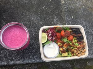 Best Vegan Bowl with three kinds of legumes, avocado, hot sauce and cashew cream and the red beat smoothie  at The Fresh Seeds in Berlin