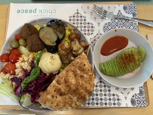 Vegan rice plate with side of avocado (added sriracha)  at Chick Peace 칙피스 - Gangnamgu in Seoul
