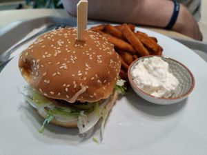 Vegan burger with sweet potato fries and vegan mayo at Loving Hut - Zlicin in Prague