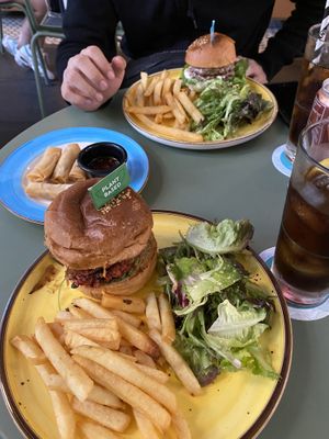 Truffled Mushroom Swiss Plant-Based Burger with bean patty and Vegetable spring rolls. at Privé - Wheelock Place in Central Singapore