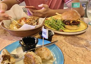 Muchos Nachos with added Impossible minced meat, Pan-fried Impossible Gyoza, Truffled Mushroom Swiss Burger using Papa’s Plant Protein patty at Privé - Wheelock Place in Central Singapore