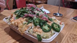 Nachos (there's chips in there somewhere) at Munchies Vegan Diner in Santa Ana