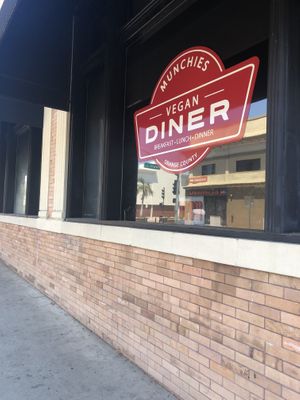 Window out front  at Munchies Vegan Diner in Santa Ana