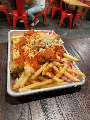 Pizza fries! So good!!! at Munchies Vegan Diner in Santa Ana