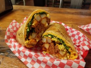 Sky's giant breakfast burrito (picture misleading, it's massive, twhs) at Munchies Vegan Diner in Santa Ana