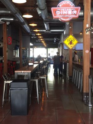 Seating inside is more like a shared cafeteria area than a diner.  at Munchies Vegan Diner in Santa Ana