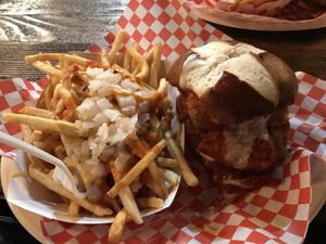 Chicken parm sandwich & human fries  at Munchies Vegan Diner in Santa Ana