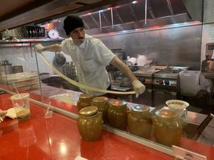 The biang  biang noodles are pulled in front of your eyes at Very Fresh Noodles in New York City
