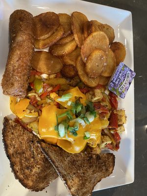 Tofu scramble with vegan cheese and vegan sausage   at MSP - Peoples Organic - T1 in St Paul