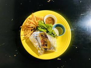 The food presentations has changed! They don't use disposable plastic (plates, drink cups, forks etc). Colorful plates looks so nice!   at Hideout Burrito in Tokyo