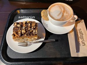 Peanut chocolate cake and hot chocolate  at Sattgrün Kolumba Viertel - Mitte in Cologne