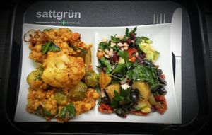 Brusselssprouts with pear slice and onion in mustard white wine sauce; cauliflower chickpea curry and a salad mix at Sattgrün Kolumba Viertel - Mitte in Cologne