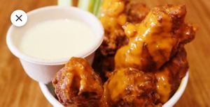 Buffalo Tenders
Crispy fried tenders with Buffalo sauce, ranch and celery. at Green Burger in Collingwood