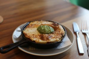 Vegan Grits Cake with Spinach Pesto! (Vegan, Gluten Free) at Satellite in Santa Barbara