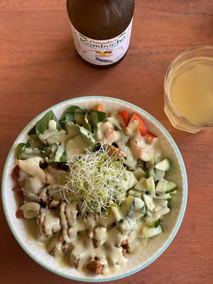 Build your own bowl with spicy tempeh, spinach, tomatoes, cucumber, quinoa, and lemon tahini  at One Happy Bowl in Noord