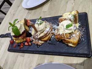 French Toast Board 🩵 at Green Eggs Cafe - Midtown Village in Philadelphia
