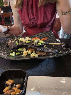 Antichucho appetizer of char-grilled mushrooms and potatoes  at Mestizo Fusion Cuisine in West Palm Beach