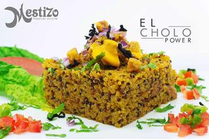 CHOLO POWER A vegan choice of quinoa bathed in aji amarillo serve with sweet potatoes, cilantro, onions and delicious Seitan Tidbits at Mestizo Fusion Cuisine in West Palm Beach