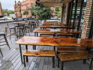 A patio with partial shade... at Industry in San Marcos