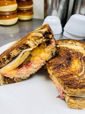 Vegan Reuben Sandwich- house made fried seitan, vegan mozzarella, 1000 island dressing, sauerkraut and pickled onions, on marble rye. 
(Vegan) at Newcastle Publick House in Newcastle
