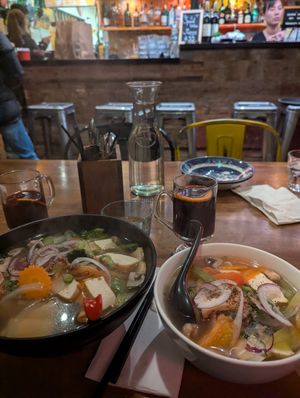 Vegan noodle soup (XL to the left, normal to the right). And mulled wine. YUM at Saigon Kingdom - Beach St in Queenstown