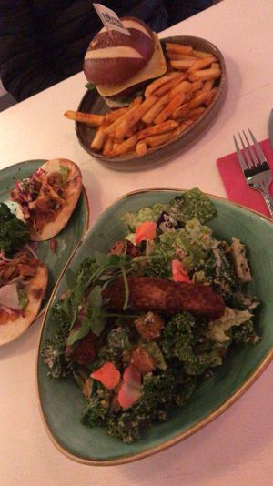 Tempeh Caesar salad and cheeseburger at Kalifornia Kitchen in London