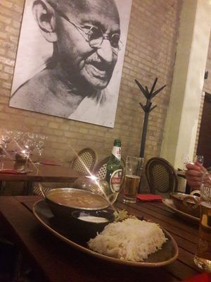 The restaurant interior and chana masala at Cafe Mumbai in Aalborg