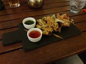 Onion bhaji with sweet chili sauce and coriander chutney at Cafe Mumbai in Aalborg