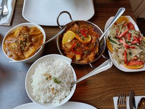 The salad with strawberry really complemented the curries! at Uit India in Alkmaar