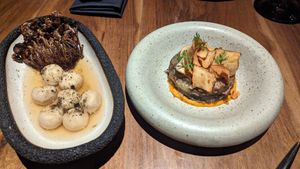 esquerda: ricota de castanha de caju com cogumelos e caldo de algas, direita: folhado com cheddar de abóbora at SACRO in Buenos Aires