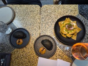 Empanadas y nachos at SACRO in Buenos Aires