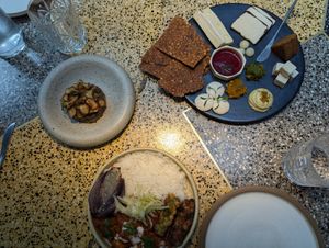 Thai curry rojo, alcaucil, y plato de queso at SACRO in Buenos Aires