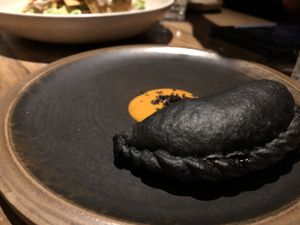 Carbón activado, empanada exquisita!   at SACRO in Buenos Aires