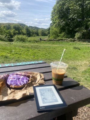 Doughnut got squashed in my bag! (coffee from elsewhere)  at Little Fitzroy Coffee in Edinburgh