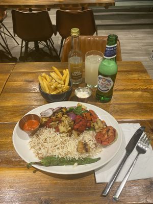 Having the most amazing delicious🤤vegan🌱mixed grill, rice, pineapple and fries as starter and main course around West London..  at Vegology in West London