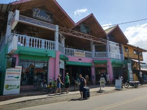 The building where the café and co-working space is located upstairs on the main road of the town. at Puerto&Co in Puerto Viejo De Talamanca