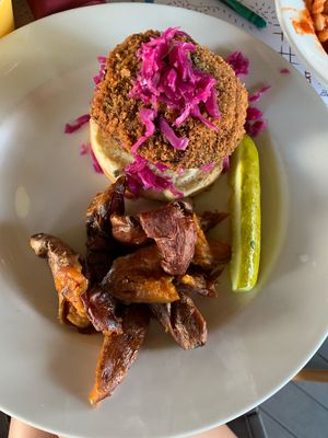 Portobello schnitzel with a side of sweet potato! Ask for no mayo to veganize  at Skull Creek Dockside in Hilton Head Island