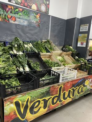 Variety of types of Greens and  lettuce   at Il Mercatone della Frutta in Collesano