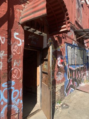 A door to the restaurant  at Savage Food in Kyiv