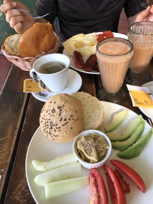 Vegan breakfast for me and English breakfast for my boyfriend   at Black Sheep in Mancora