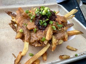 Vegan poutine with sambal. Bomb!  at Saus at Bow Market in Somerville