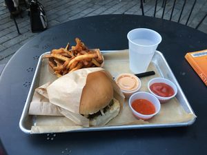 Meal with a veganized veggie burger at Saus at Bow Market in Somerville