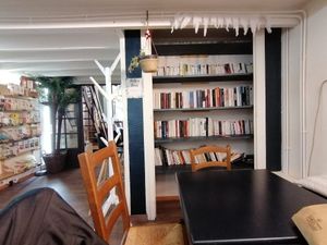 Cozy seating area in the back at Le Petit Colibri in Lyon