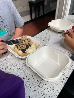 Cookie dough orange frosting   at Cinnaholic in Seattle