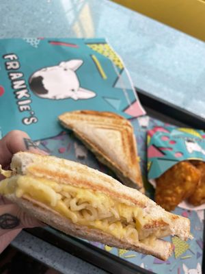 Toast with noodles and some hash browns  at Frankie's Toasties in Manchester